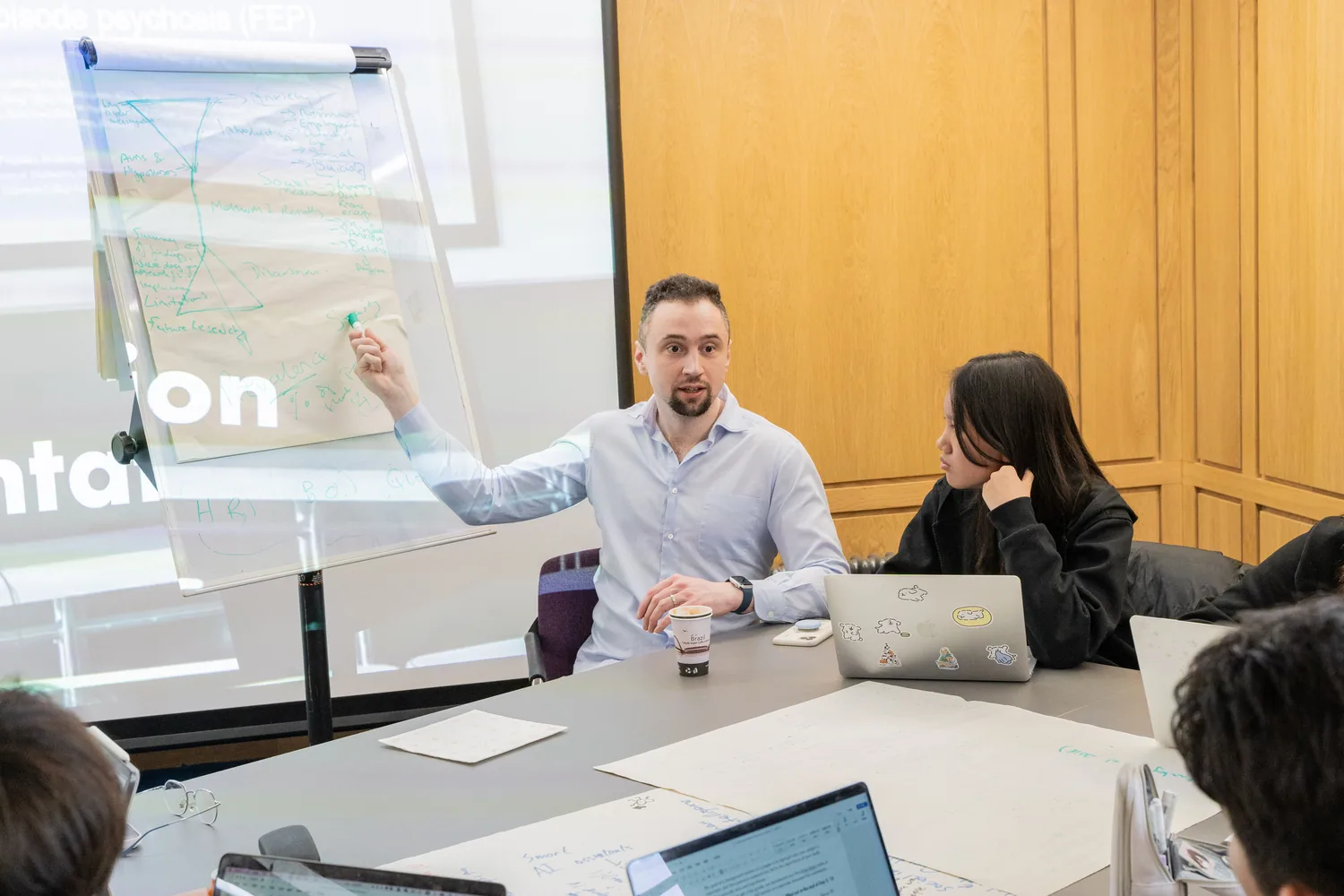 Dr Samuel Swidzinski teaching a research workshop